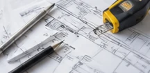 Illustrative architectural drawings and a measuring tape